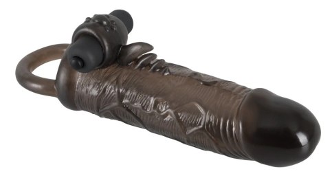 Rebel - Wibrująca Nakładka Na Penisa Z Pierścieniem Jąder 19cm Rebel - Wibrująca Nakładka Na Penisa Z Pierścieniem Jąder 19cm